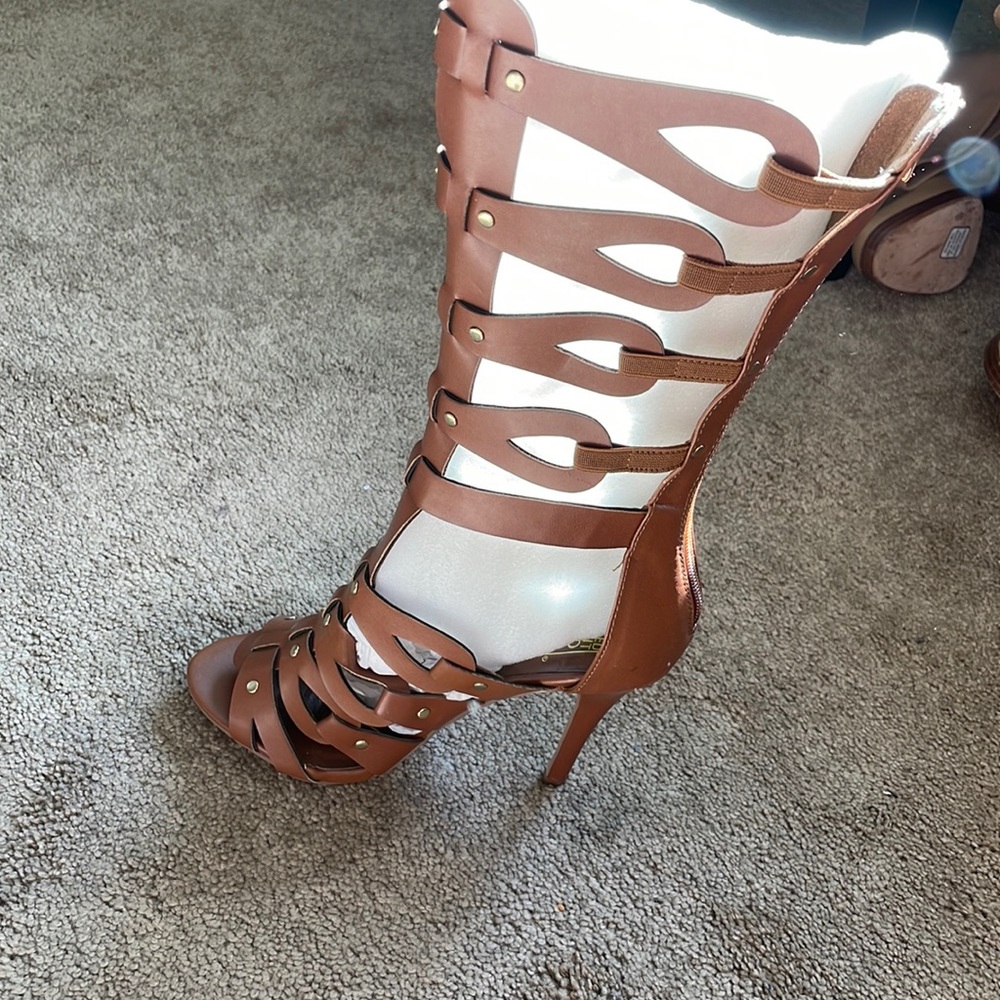 Brand new. Never worn Sandal heel boots